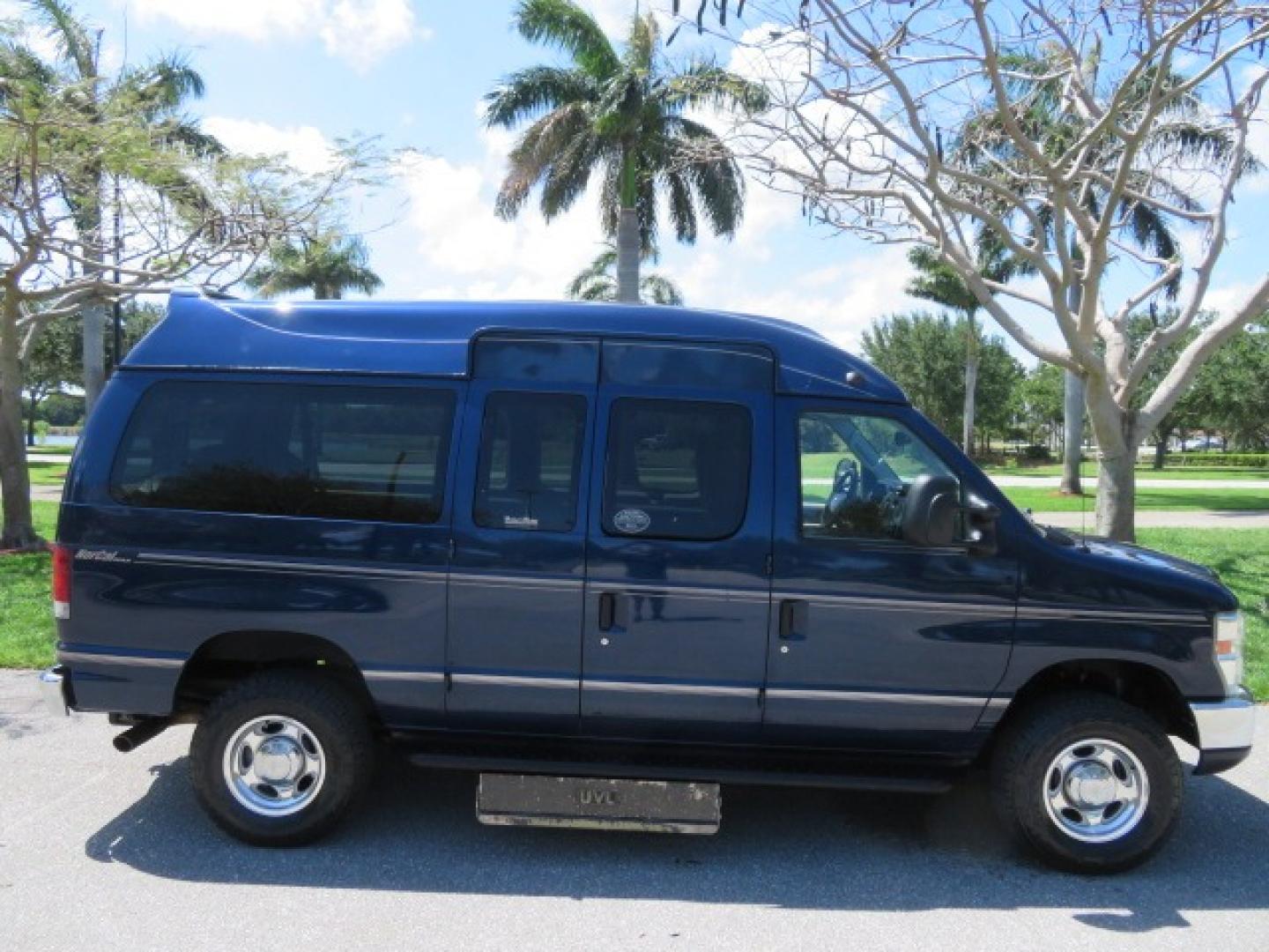 2011 Dark Blue /Gray Ford E-Series Wagon E-350 XLT Super Duty (1FBNE3BS4BD) with an 6.8L V10 SOHC 20V engine, located at 4301 Oak Circle #19, Boca Raton, FL, 33431, (954) 561-2499, 26.388861, -80.084038 - You are looking at a Gorgeous 2011 Ford Econoline E350 XLT Norcal Max High Top Handicap Wheelchair Conversion Van with 6.8L V10, 15K Original Miles, 9 Inch Lowered Floor, Braun UVL Side Entry Wheelchair Lift, Remote Control Power Side Entry Doors, Expanded Side Entry Doors, Q Straint Tie Down, Syste - Photo#18